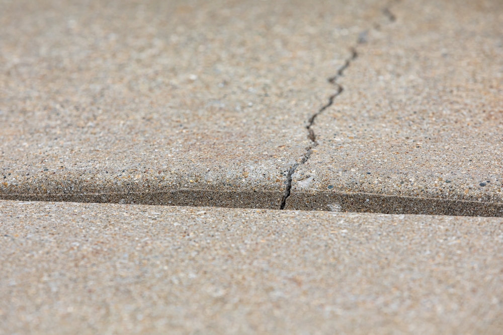 Concrete,Driveway,Cracked,And,Settling.,Home,Inspection,,Slab,Jacking,And