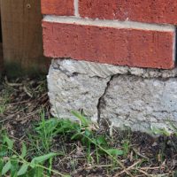 Crack,Near,Corner,Of,Foundation,,Foundation,Issues,On,A,Residential